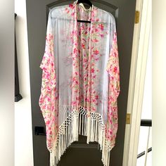 This Beautiful Silk Kimono Is Perfect Boho-Wear For Your Closet. Can Be Worn Over T-Shirt With Jeans, Or Dressed Up For Formal Occasions. Never Worn. Like New. Colors In Shades Of Pink Multi. Casual Spring Kimono With Tassels, Spring Fringed Long Sleeve Kimono, Spring Long Sleeve Fringed Kimono, Spring Fringe Long Sleeve Kimono, White Spring Outerwear With Tassels, White Tasseled Outerwear For Spring, Spring Fringe Shawl Outerwear, Long Tasseled Kimono For Spring, Spring Festival Shawl Outerwear