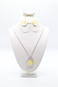 Beautiful Yellow Earrings and Necklace Modern Nickel-free Teardrop Pendant Jewelry, Modern White Teardrop Necklace, Yellow Handmade Drop Jewelry, Modern Yellow Jewelry For Gift, Modern Yellow Jewelry For Gifts, Handmade Yellow Drop Jewelry, Yellow Pendant Necklace Nickel Free, Nickel-free Yellow Round Pendant Jewelry, Nickel-free Yellow Pendant Necklace