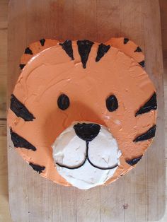 a cake shaped to look like a tiger's head