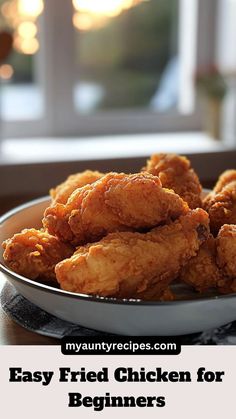 fried chicken for beginners on a plate with the words easy fried chicken for beginners