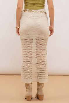 Expertly crafted with an elasticized waist for a comfortable and flexible fit, this Natural Crochet midi skirt features a straight cut and ribbed hem for a flattering silhouette. The knit design is lined for added coverage, making it a versatile and stylish choice for any occasion. Fabric & fit:SHELL: 93%ACRYLIC, 7%NYLONLINING: 100%POLYESTER Model is wearing size small. Spring Fitted Pointelle Knit Skirt, Fitted Pointelle Knit Skirt For Spring, Summer Stretch Pointelle Knit Bottoms, Chic Fitted Pointelle Knit Skirt, Knit Lined Midi Skirt, Chic Pointelle Knit Spring Skirt, Chic Pointelle Knit Skirt For Spring, Fitted Knit Skirt With Lining, Chic Spring Pointelle Knit Skirt