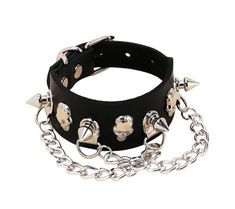 "Chained Up": Show off your gothic flair with this sassy Chained Up Black Leather Choker and Bracelet Set! Constructed from sleek black leather, the set features shiny chains and rings for a sultry yet edgy look. The adjustable choker and bracelet make it easy to show off your unique style. The bracelet is adorned with spikes and skulls. Ready to take the world by storm? It's time to get 'chained up'!😉 Necklace measures approximately 17" and is adjustable. Bracelet measures approximately 9.5 an Black Rock Style Jewelry For Halloween, Black Rocker Style Metal Jewelry, Black Metal Rocker Jewelry, Black Metal Rocker Style Jewelry, Black Rocker Jewelry With Rivets, Punk Black Jewelry With Chain Strap, Black Punk Jewelry With Chain Strap, Gothic Leather Jewelry For Party, Black Leather Punk Jewelry