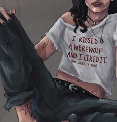 a drawing of a woman with black hair and tattoos on her arm, wearing a t - shirt that says i kissed a werewolves and i liked it too