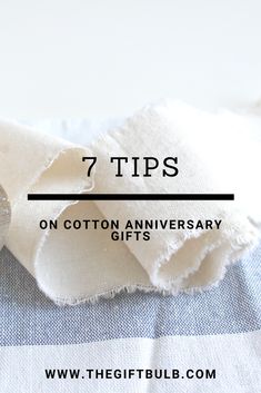 white fabric with the words 7 tips on cotton anniversary gifts in black and white text