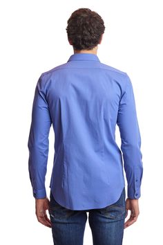 An elegant slim-fit spread collar shirt in a rich blue color. Poly-rayon stretch gives this shirt a comfortable, yet elegant appearance that can be worn all year long. This shirt can be worn with a variety of tops and bottoms.PRODUCT DETAILS: style 6537W slim fit dress shirt spread collar printed fabric poly-rayon stretch blend dry clean only imported Blue Slim Fit Shirt For Office, Blue Slim Fit Shirt For Semi-formal Occasions, Solid Slim Fit Shirt With Spread Collar, Blue Slim Fit Collared Dress Shirt, Blue Slim Fit Dress Shirt For Office, Blue Slim Fit Dress Shirt, Blue Slim Fit Formal Top, Blue Slim Fit Business Top, Blue Business Shirt With Spread Collar