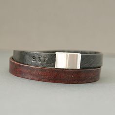 Black and Brown Double Wrap Leather Bracelet - Subtly Personalized with Magnetic Clasp Discover our elegant black and brown double wrap leather bracelet, perfect for those who appreciate understated style. Made from premium leather, this bracelet wraps around your wrist twice, offering a chic and layered appearance. This bracelet features subtle personalization, allowing you to add a personal touch without compromising its sleek design. Whether it's your initials or significant date your customi Black Engraved Rectangular Leather Bracelet, Brown Leather Strap Double Band Bracelets, Modern Black Leather Double Band Bracelet, Masculine Leather Bracelet With Black Band, Masculine Brown Leather Bracelet For Everyday, Bracelet For Man, Personalized Leather Bracelet, Leather Bangle, Understated Style