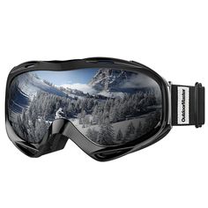 a pair of ski goggles with an image of mountains and trees in the background