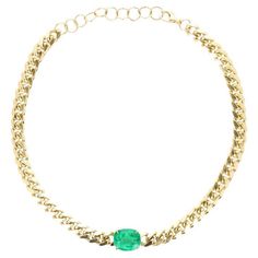 Featured here is a 10.85-carat stunning, emerald choker necklace in 18K yellow gold. Displayed in the center is a natural cushion cut Colombian emerald accented by a simple prong setting, allowing for the emerald to be shown in full view. The earth-mined Muzo emerald has a desirable lush green color with excellent qualities. A 13-15 inch solid gold Cuban link chain is attached to the emerald pendant. Chain Style: Solid Cuban Link Chain Lenght: 13-15 inches, Adjustable Gold Weight: 81.4 Grams Set Luxury Oval Emerald Necklace With Jewels, Oval Emerald Necklace With Jewels In Fine Jewelry Style, Fine Jewelry Oval Emerald Necklace With Jewels, Oval Emerald Necklace With Jewels, Luxury Green Chain Jewelry, Emerald Choker, Pear Shaped Diamond Necklace, Gold Cuban Link Chain, Natural Cushions