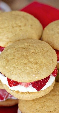 strawberry shortcakes are stacked on top of each other