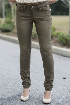 These Aiko skinny jeans are in a perfect bronze color. They feature a mid rise, a slightly curvy fit, a slim hip and thigh, and a skinny leg. Stretch Green Jeans With Pockets, Military Style Green Cargo Jeans With Hip Pockets, Green Military Style Cotton Jeans, Olive Skinnies, Military Style Green Cotton Jeans, Slim Hips, Silver Jeans, Bronze Color, Grey Jean