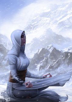 a woman sitting on top of a snow covered mountain