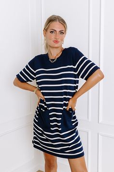 - Step into summer elegance with our chic striped mini dress, the perfect blend of sophistication and playful charm. Effortlessly combining a classic striped pattern with a relaxed silhouette, it is sure to keep you looking country club cute! Add a little bit of class and a little bit of sass to your wardrobe with this must-have piece. - Unlined thigh knit material with a striped pattern - A crew cut neckline - Short sleeves - Functional low pockets - A relaxed silhouette that ends in a straight Summer Elegance, Crew Cut, Crew Cuts, Striped Mini Dress, Knitting Materials, Country Club, Dress Length, Short Sleeves, Sleeve Length