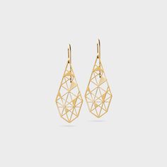 These geometric earrings in an elongated drop shape caress the face, and round off any outfit. Filled triangular surfaces in a lattice structure reflect the light in a beautiful way.  Dimensions of earrings: 18x40  Material: Brass gold-plated (nickel-free)  Material of the ear hooks: Brass gold-plated (nickel-free, hypoallergenic)  This item of jewellery is waterproof and does not tarnish!  The jewellery is sent in a high quality and recycled gift box. Modern Geometric Earrings For Pierced Ears, Modern Geometric Earrings For Party, Modern Geometric Ear Wire Earrings, Modern Geometric Linear Earrings For Gifts, Modern Geometric Party Earrings, Modern Geometric Pierced Earrings, Lattice Structure, Drop Earrings Gold, Round Off