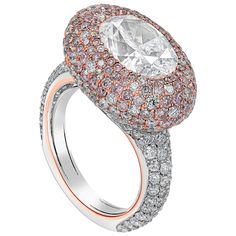 A luxurious cocktail ring, showcasing a 4.02 carats oval cut diamond certified by GIA as Natural Fancy White. Accented by round cut pink and white diamonds, beautifully set on a dome in a micropavé style and a diamond encrusted shank in a half-way setting. Fancy pink diamonds weigh 2.23 carats total and white diamonds weigh 1.70 carats total with VS clarity. Finely made with an 18K rose gold and platinum mounting. Can be worn between sizes 5.5 and 6.75 US.  Roman Malakov is a custom house, speci Yellow Gold Cocktail Ring, Pink Diamonds, Womens Rings Fashion, Diamond Fashion Rings, Gold Cocktail Ring, Diamond Jewelry Designs, Diamond Cocktail Rings, Yellow Gold Setting, Oval Cut Diamond