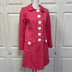 Very Beautiful Coat On Original Millie Of New York. Women’s Size 2 Pink Coat 100% Cotton. Please See The Pictures For The Measurements. The Conditions Is Great. Spring Outerwear With Notch Lapel And Covered Buttons, Spring Outerwear With Covered Buttons And Notch Lapel, Designer Pink Single-breasted Outerwear, Retro Long Sleeve Outerwear With Covered Buttons, Designer Pink Outerwear With Button Closure, Fitted Outerwear With Button Cuffs For Daywear, Fitted Outerwear With Covered Buttons For Daywear, Designer Spring Outerwear With Covered Buttons, Pink Coat