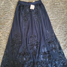 New, Badgley Mischka, Navy Blue, Long Skirt (About 45 In Long), Wear With A Crop Top Or Nice Blouse. This Skirt Will Make Your Next Formal Event A Comfortable Success! Elegant Blue Cocktail Skirt, Chic Blue Evening Maxi Skirt, Spring Formal Embellished Skirt, Chic Blue Maxi Skirt For Party, Formal Flowy Blue Maxi Skirt, Blue Maxi Skirt For Spring Party, Blue Relaxed Maxi Skirt For Party, Blue Formal Maxi Skirt For Spring, Formal Blue Maxi Skirt For Spring