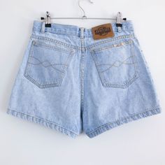 Vintage high waist shorts jeans in light blue of the 90's. This vintage women denim shorts has classic and streetstyle. The shorts is cotton fabric by John F. Gee in perfect vintage conditions. The modern size of this denim short is Medium - the waist contour fit is 29,9 in (76 cm) ** MEASURES FLAT ** Waist 14,9 in // 38 cm Hip 19,6 in // 50 cm Rise (front) 11,4 in // 29 cm Rise (back) 14,5 in // 37 cm Inner leg 2,7 in // 7 cm Length 13,3 in // 34 cm Bottom width 11,4 in // 29 cm Reference: Mode Women Denim Shorts, 90s Shorts, Light Blue Shorts, High Waist Shorts, High Waisted Jean Shorts, Denim Short, Denim Shorts Women, Shorts Jeans, Vintage Women