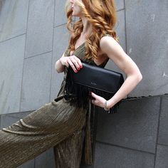 The signature Bonnie Crossbody Clutch is impossibly elegant and divine, but also ready to go out dancing in a breath. Wear it with a sequined mini dress or jeans and a turtleneck, it will make you the centre of attention whatever look you choose to create. It is roomy enough to hold your phone, keys and even a bottle of perfume. Carry it as a clutch or attach the optional shoulder strap to wear it cross-body. Elegant Bags For Night Out And Party Season, Trendy Clutch Evening Bag For Night Out, Chic Evening Bag For Fall, Chic Evening Bags For Fall, Elegant Evening Bag For Night Out, Glamorous Evening Bags With Fringe, Chic Fringe Evening Bag, Chic Fringed Evening Bag, Elegant Fringe Evening Bag