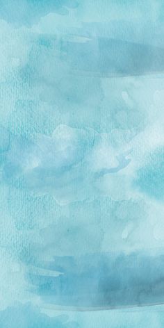 an abstract blue watercolor background with white clouds