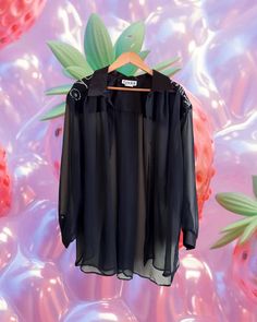 Elevate your evening style with our Vintage 90s Black Chiffon Blouse! Perfect for a night out, this versatile piece seamlessly transitions from an art night to a classy cocktail party. With its elegant design and timeless appeal, this blouse is your go-to choice for making a sophisticated statement.  Size: L Condition: Good Note: All Vintage items are preloved from another life time. Classy Cocktail Party, Cocktail Chic, Black Chiffon Blouse, Evening Style, Art Night, Black Chiffon, Night Art, Chiffon Blouse, Life Time