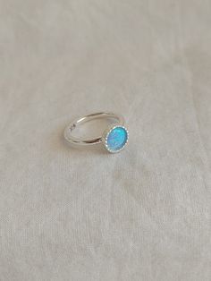 It is a simple and delicate silver ring with a beautiful opal stone. Perfect as a birthday gift with a birthstone. Mother's daughter's ring Handmade sterling silver ring with  Opal stone set like a crown. A sweet and simple ring or everyday wear. Perfect gift for someone you love. Size to order: 2- 13 U.S Stone size: 6 mm. For more stones, and birthstones please convo me.   What is a lab-created opal? A lab-created opal is an opal, grown in a lab setting, that has the same exact chemical composi Mother Daughter Rings, Delicate Silver Rings, Daughter Ring, Handmade Sterling Silver Rings, Simple Band, Garnet Bracelet, Simple Ring, Stacked Bangles, Opal Stone