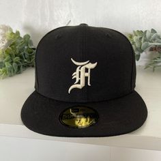 New! Size 7 Black Fitted Cap. Short Brim Fitted Hat For Baseball Season, Streetwear Fitted Hat With Embroidered Logo, Classic Black Fitted Baseball Cap, Classic Fitted Hat For Streetwear, One Size, Classic Fitted Hat For Streetwear, Urban Black Fitted Hat For Baseball Season, Black Urban Fitted Hat For Baseball Season, Urban Black Dad Hat For Everyday Wear, Urban Black Dad Hat For Everyday