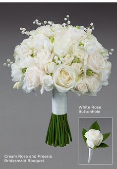 a bridal bouquet with white roses and baby's breath