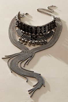 Add a stand-out touch to absolutely any style with this stunning necklace featured in a layered silhouette and staple metal fabrication with fringe beading and bolo-inspired chain detailing at bottom for added dimension. | Sadie Necklace by Free People in Silver Luxury Silver Bib Necklace For Statement Occasions, Luxury Silver Bib Necklace For Statement, Metal Chain Bib Necklaces, Luxury Silver Bohemian Chain Necklace, Silver Bohemian Bib Necklace Choker, Christmas Party Fashion, Party Styling, Womens Jewelry, Bold Jewelry