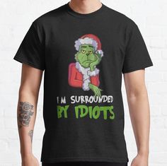 Standard fit with double-needle hems for durability. Solid colors are 100% preshrunk cotton, heather colors are cotton blend. Range of colors available, with the option to print on front or back. Size range S-3XL, suitable for men and women. I_m Surrounded by Idiots Christmas Grinch T Shirt, Christmas Classic, Latest T Shirt, New T, Classic Christmas, Christmas Humor, Grinch, Funny Tshirts, Solid Colors