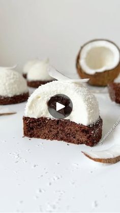 a piece of chocolate cake with coconuts around it