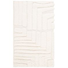 a white rug with squares and lines on it