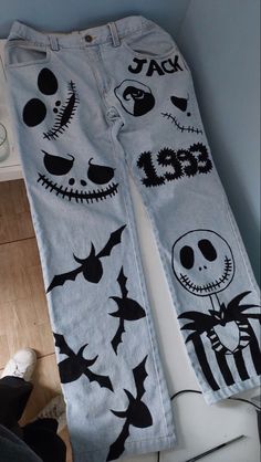 the jeans are decorated with halloween images