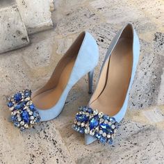 Step into elegance with our Light Blue Vegan Suede Stiletto Heels. Adorned with dazzling rhinestones, these pumps add a touch of glamour to any outfit. Ethically crafted from vegan suede, these heels are both stylish and cruelty-free. Color: Light blue Material: Vegan suede Heel height: 4.72" / 120 mm approx Product measurements were taken using size 8. Please note that measurements may vary by size. Toe: Pointed toe Faux crystal and rhinestone embellishment Handcrafted US sizing. Fits true to size. Heels Rhinestone, Rhinestone Pumps, Pumps Heels Stilettos, Gorgeous Shoes, Fabulous Shoes, Shoe Clips, Pretty Shoes, Shoe Obsession, Heel Pumps