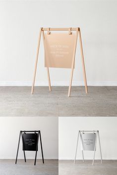 four different types of signs on display in an empty room with white walls and wood flooring