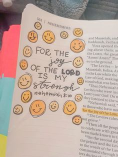 an open bible with emoticions written on it and the words for the joy of the lord is my strength