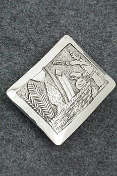 This sterling silver belt buckle featuring an Native American man blessing a basket of native goods was made by Navajo silversmith Elaine Becenti. The back of the buckle is signed B and stamped sterling.Length: 2"Width: 3"Free shipping on all orders! We ship with USPS and always include tracking. All orders ship within a day of payment.Returns are accepted up to 30 days after you receive your order. Just send us a message. Our shop offers cash back or store credit. The item must be returned in new condition. Native American Men, Bear Carving, Instagram Jewelry, Silver Belt Buckle, Silver Belt, Silver Belts, Pearl Chain, Belt Buckle, Belt Buckles