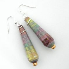 the earrings are made with glass beads