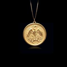 PENDANT INFORMATIONThis pendant is made of real, solid gold.• Made in USA• Material: 14k or 18k solid gold• Finish: polished• Height: 1.1" (28,5 mm) | *includes the small circle, bail dimensions not included• Width: 1" (25,5 mm)• Pendant weight: approx. 6 grams (14k)• Bail: fits up to 4 mm chains• Solid back, not hollow• A certificate of authenticity is included• Delivered in our elegant jewelry box, making it the perfect gift Shipping: All of our orders are custom-made. Please allow approximate Mythical Bird, Phoenix Jewelry, Phoenix Pendant, Phoenix Design, Small Circle, Solid Gold Chains, Mini Pendants, Box Making, Solid Gold Jewelry