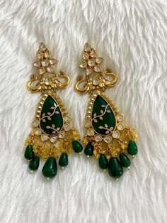 Sabyasachi inspired uncut Polki Kundan designer earrings. Gold plated. Semi precious stones and beads. Length 13cm If have any queries please ask. Elegant Designer Jhumkas For Festive Occasions, Elegant Designer Festive Jhumkas, Festive Elegant Designer Jhumkas, Traditional Designer Earrings For Diwali, Designer Stone Work Jhumkas For Festive Occasions, Festive Designer Earrings With Latkans, Designer Chandbali Earrings With Latkans, Elegant Chandbali Earrings For Designer Wear, Elegant Chandbali Designer Earrings