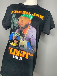 In a 90s kinda world be glad you got us. We bringing back the original concert tee designs we all loved.  check out the artist we collaborated with for this unique logo look Jam .  Follow him on Ig @freshjam  for more Merch And tunes Details: unisex adult size 90s Style Sublimation Print T-shirt For Streetwear, 90s Style T-shirt With Sublimation Print For Streetwear, Cotton T-shirt For Festival Streetwear, 90s Logo Print T-shirt For Concerts, 90s Style Concert T-shirt With Screen Print, 90s Style Logo Print T-shirt For Concerts, 90s Graphic T-shirt For Streetwear, 90s Style Concert T-shirt With Logo Print, Sublimation Print Tops For Streetwear At Music Festivals