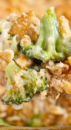 a spoon full of broccoli casserole with bread crumbs