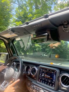 the interior of a car with dashboard and dash lights