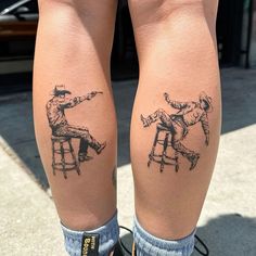 two people sitting on stools with tattoos on their legs