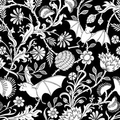 a black and white pattern with flowers, leaves and bats on it's sides