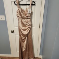 Reverly Ariel In Champagne Gold Satin. Brand New. Never Worn Or Altered. Size 6. I Was Unable To Be In The Wedding Due To A Work Conflict. Wedding Mermaid Dress With Ruched Bodice For Prom Season, Sleeveless Champagne Bridesmaid Dress, Champagne Sleeveless Evening Dress For Bridesmaid, Champagne Fitted Maxi Bridesmaid Dress, Champagne Fitted Maxi Dress For Bridesmaid, Sleeveless Champagne Evening Dress For Bridesmaid, Holiday Floor-length Bridesmaid Evening Dress, Holiday Floor-length Bridesmaid Dress, Fitted Holiday Maxi Dress For Bridesmaids