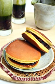 two pancakes are stacked on top of each other