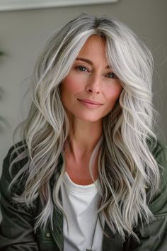 Explore cool hairstyles that integrate long layers, perfect for adding texture and depth to silver hair. These styles for women over 50 are trendy yet sophisticated, suitable for enhancing your natural elegance. White Hairstyles For Women, Long Grey Hair Over 50, Hairstyles With Long Layers, Long Hair No Layers, Long Layered Haircuts For Thick Hair, Long Hair Over 50 Older Women, Long Gray Hair Styles, Long Gray Hair Over 50