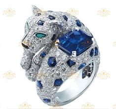 "💕What sets us apart? Center Stone: Sapphire Main Stone shape: Cushion Main Stone Color/Clarity: Blue Main Stone Weight: 2.40 Ct Approx. Side Stone: Cubic Zirconia Side Stone Shape: Round Side Stone Color/Clarity: White Metal :Solid 925 Sterling Silver Type : Wedding Engagement Ring Style: Panther Ring Occasion: Wedding, engagement, Gift, Party. ♥ Item Detail: > Material: 925 Sterling Silver > Stamp: 925 SIL We can make any JEWELLERY for you of any design, gemstone and any material (925 s Cartier Panther, Panther Jewelry, Panther Ring, High Jewelry Ring, Cartier Panthere, Cushion Cut Ring, Cartier Jewelry, Cat Jewelry, Dream Jewelry