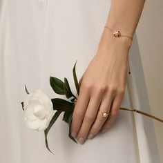 18K rose gold and Akoya pearl Pearl Size: 6.5-7.0 mm Chain length: 18.5 cm (adjustable) Weight of Diamonds: 1 diamond approx. 0.035 carats Handpicked of every pearl, only the top 1% of pearls are selected The bracelet can be customized with letters, replacing "HELAS" with other content, defaulting to "HELAS" if no specific instructions are provided. Custom-made products are non-refundable or exchangeable for reasons other than quality issues. For 18K white gold or 18K yellow gold, contact helas@ Luxury Rose Gold Bracelets For Wedding, Luxury Rose Gold Wedding Bracelets, Wedding Diamond Pearl Bracelet In Fine Jewelry Style, Fine Jewelry Diamond Pearl Bracelet For Wedding, Wedding Fine Jewelry Diamond Pearl Bracelet, Delicate Rose Gold Jewelry With Single Diamond, Wedding Pearl Bracelet With Diamonds, Elegant 14k Pink Gold Bracelets, Elegant Rose Gold Bracelets For Wedding