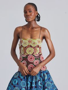 Lisa Folawiyo's pieces celebrate Nigeria's cultural heritage via colorful motifs and intricate embellishments. This midi dress has been handcrafted from panels of cotton lace and detailed with scores of beads to create a vibrant floral pattern. Fitted through the bodice, it flares out to a full circle skirt. Team yours with heels and simple jewelry.- Spaghetti straps, midi length, zip fastening, dropped waist- Cotton- Handcrafted by the in-house team of artisans using environmentally friendly an Lisa Folawiyo, A Line Skirt Midi, African Luxury, Full Circle Skirt, Fresh Linen, Dress A Line, Full Circle Skirts, Maxi Shirt Dress, Skirt Midi